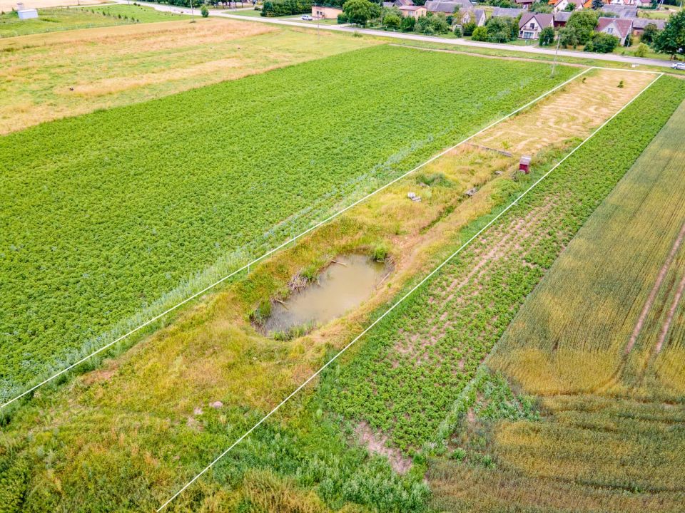 Sklypo ribose visos miesto komunikacijos. Parduodamas 20,8 arų namų valdos sklypas Jonelaičių g. 9, Sauginiai, Šiaulių r.