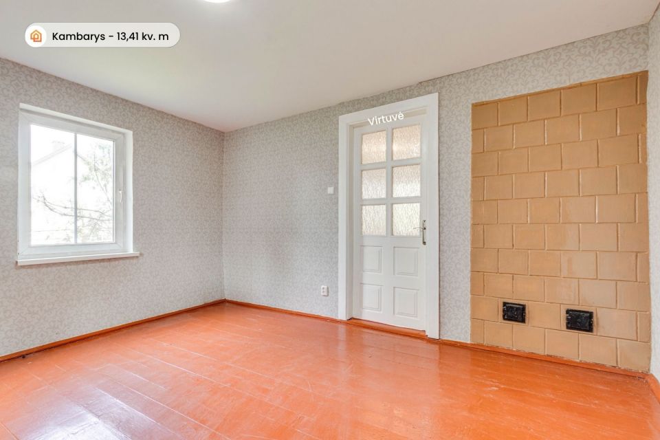 Parduodama įrengta rąstinio namo dalis 42,23 kv. m ploto su sklypo dalimi Radvili&scaron;kyje, Dariaus ir Girėno g. 102.
