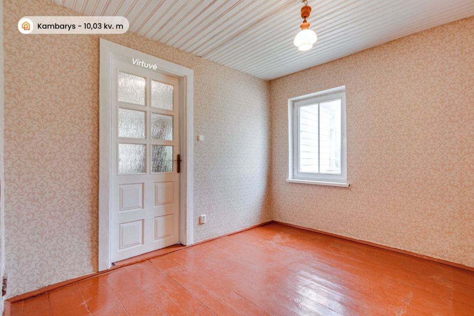 Parduodama įrengta rąstinio namo dalis 42,23 kv. m ploto su sklypo dalimi Radvili&scaron;kyje, Dariaus ir Girėno g. 102.