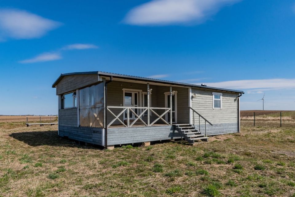 Parduodamas mobilus namelis su 13,42 arų žemės sklypu, Kretingos r. sav., Vydmantų sen. Kiauleikių k., Baltijos aklg.