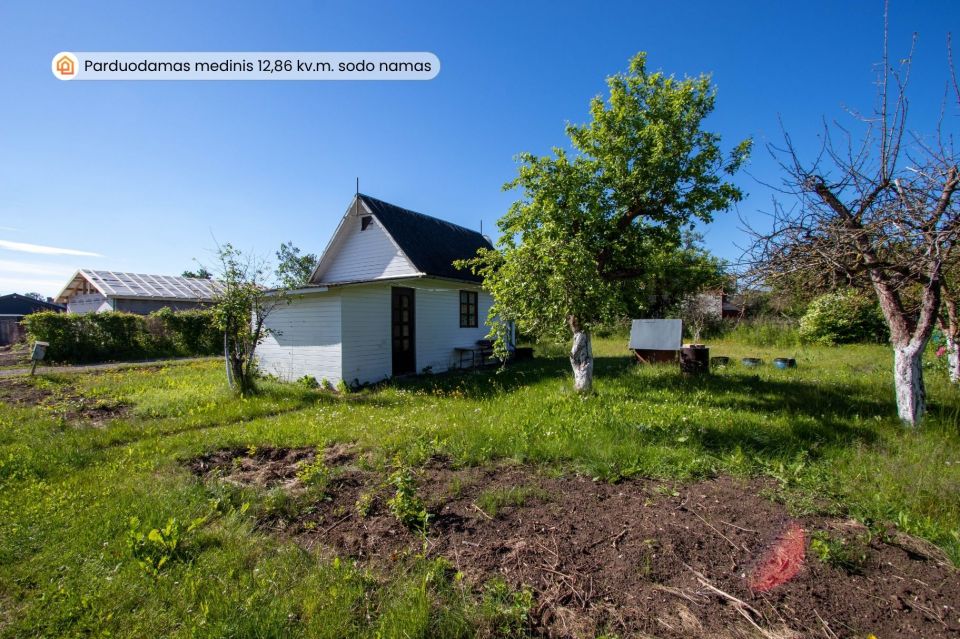 Parduodamas sodo sklypas su mediniu 12,86 kv.m. sodo nameliu, Lelijų g.14, Jubiliejinis 2 sodai, Toliočiai, &Scaron;iaulių r.