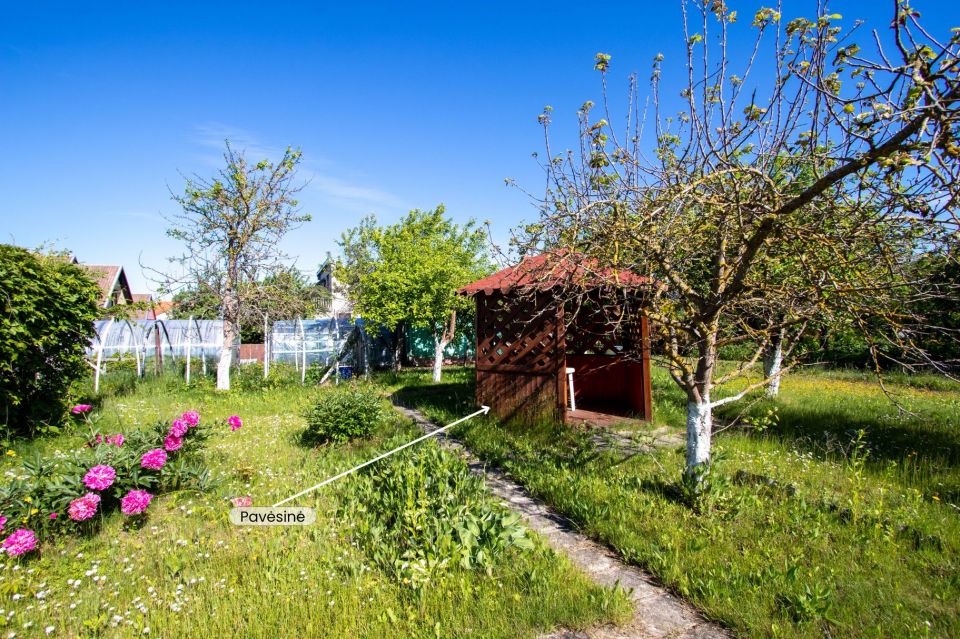 Parduodamas sodo sklypas su mediniu 12,86 kv.m. sodo nameliu, Lelijų g.14, Jubiliejinis 2 sodai, Toliočiai, &Scaron;iaulių r.